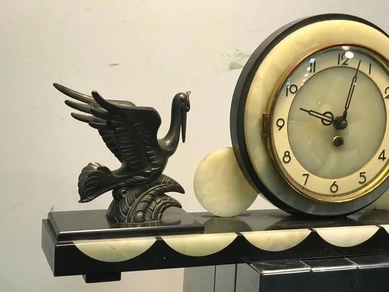 French Art Deco Marble and Onyx Mantel Clock with Flying Herons